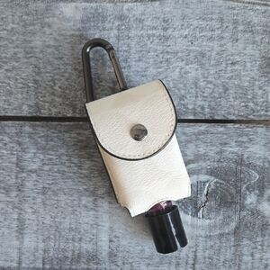 Coach Hand Sanitizer Key Chain White with Black Trimmed Leather